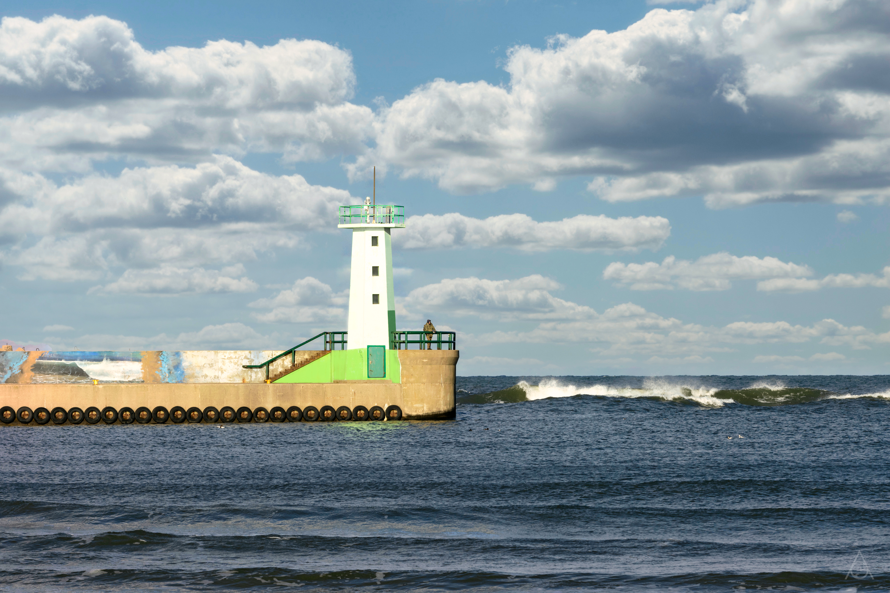 The lighthouse at the entrance to the port in Wladyslawow